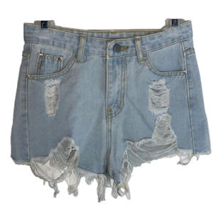 Super cute light wash ripped jeans shorts. size xs but fits a 0/2 better